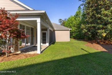 Easy living in this luxury townhome in the highly desirable on Cape Fear National At Brunswick Forest in North Carolina - for sale on GolfHomes.com, golf home, golf lot