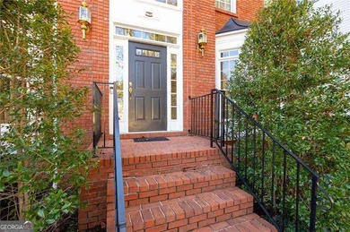 Tucked away on a quiet, double cul-de-sac street is the stately on Brookstone Golf and Country Club in Georgia - for sale on GolfHomes.com, golf home, golf lot