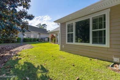 Easy living in this luxury townhome in the highly desirable on Cape Fear National At Brunswick Forest in North Carolina - for sale on GolfHomes.com, golf home, golf lot