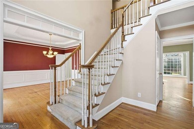 Tucked away on a quiet, double cul-de-sac street is the stately on Brookstone Golf and Country Club in Georgia - for sale on GolfHomes.com, golf home, golf lot