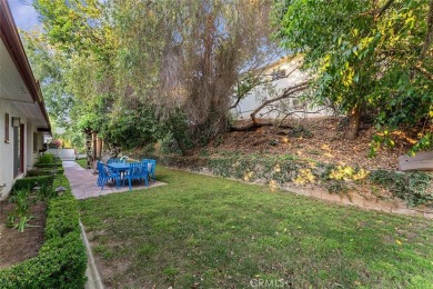 Tucked beneath the dappled shade of mature trees, this on Victoria Club in California - for sale on GolfHomes.com, golf home, golf lot