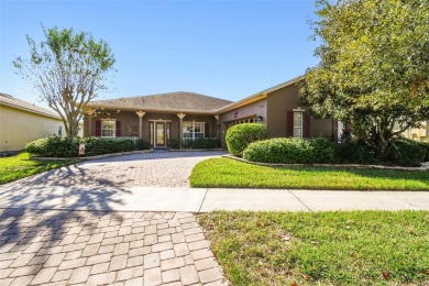 Welcome to this WELL MAINTAINED and BEAUTIFUL Mozart Model in on Stonegate Golf Club in Florida - for sale on GolfHomes.com, golf home, golf lot