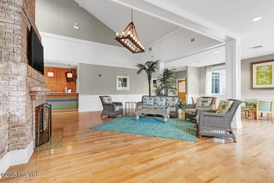 Easy living in this luxury townhome in the highly desirable on Cape Fear National At Brunswick Forest in North Carolina - for sale on GolfHomes.com, golf home, golf lot