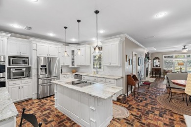Discover this beautiful brick home situated on a spacious corner on Stone Creek Golf Club in Georgia - for sale on GolfHomes.com, golf home, golf lot