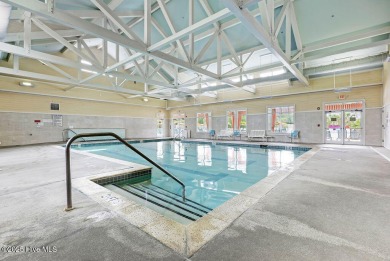 No worries in this luxury townhome with lawncare, exterior on Cape Fear National At Brunswick Forest in North Carolina - for sale on GolfHomes.com, golf home, golf lot