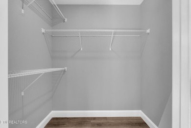 Experience the perfect blend of modern comfort and lakeside on Lake Tansi Village Country Club in Tennessee - for sale on GolfHomes.com, golf home, golf lot