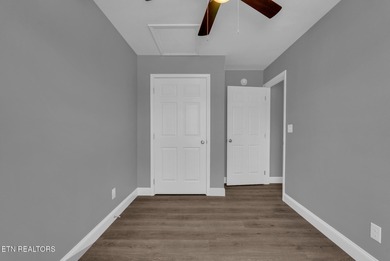 Experience the perfect blend of modern comfort and lakeside on Lake Tansi Village Country Club in Tennessee - for sale on GolfHomes.com, golf home, golf lot