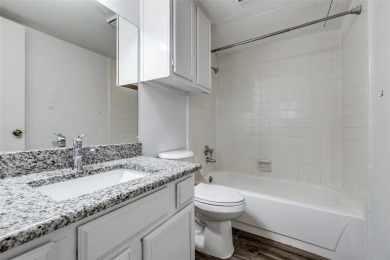 Serenity abounds in this beautifully renovated 2 bedroom, 2 and on Stevens Park Golf Course in Texas - for sale on GolfHomes.com, golf home, golf lot