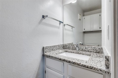 Serenity abounds in this beautifully renovated 2 bedroom, 2 and on Stevens Park Golf Course in Texas - for sale on GolfHomes.com, golf home, golf lot