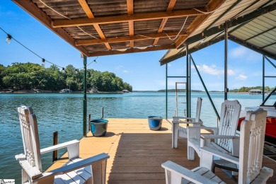 Discover the ultimate lakeside retreat with this exquisite Lake on Stone Creek Cove Golf Course in South Carolina - for sale on GolfHomes.com, golf home, golf lot