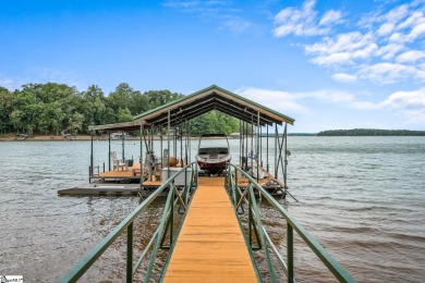 Discover the ultimate lakeside retreat with this exquisite Lake on Stone Creek Cove Golf Course in South Carolina - for sale on GolfHomes.com, golf home, golf lot