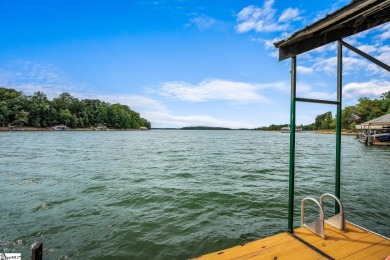 Discover the ultimate lakeside retreat with this exquisite Lake on Stone Creek Cove Golf Course in South Carolina - for sale on GolfHomes.com, golf home, golf lot