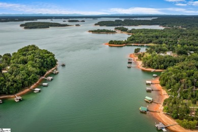 Discover the ultimate lakeside retreat with this exquisite Lake on Stone Creek Cove Golf Course in South Carolina - for sale on GolfHomes.com, golf home, golf lot