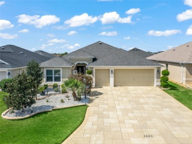 Beautiful, custom-built expanded Begonia model (2,401 heated sq on Bella Glade Country Club in Florida - for sale on GolfHomes.com, golf home, golf lot