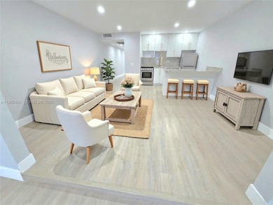 Discover comfort and peace of mind in this beautifully remodeled on Wynmoor Golf Course in Florida - for sale on GolfHomes.com, golf home, golf lot