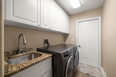 Under contract-accepting backup offers. Discover this on Tarpon Woods Golf Club in Florida - for sale on GolfHomes.com, golf home, golf lot