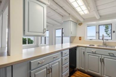 Rare lakefront opportunity on all-sports Duck Lake! Experience on Duck Lake Country Club in Michigan - for sale on GolfHomes.com, golf home, golf lot