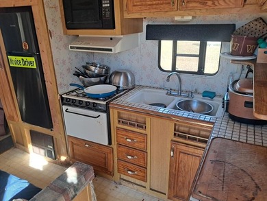 Oversized cul de sac lot with nice shed and camper on site on Captains Cove Golf and Yacht Club in Virginia - for sale on GolfHomes.com, golf home, golf lot