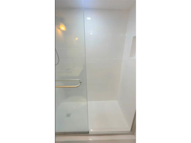 Discover comfort and peace of mind in this beautifully remodeled on Wynmoor Golf Course in Florida - for sale on GolfHomes.com, golf home, golf lot