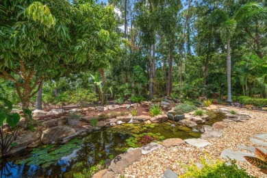 Under contract-accepting backup offers. Discover this on Tarpon Woods Golf Club in Florida - for sale on GolfHomes.com, golf home, golf lot