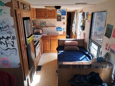 Oversized cul de sac lot with nice shed and camper on site on Captains Cove Golf and Yacht Club in Virginia - for sale on GolfHomes.com, golf home, golf lot