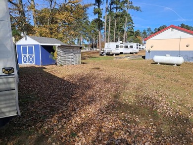 Oversized cul de sac lot with nice shed and camper on site on Captains Cove Golf and Yacht Club in Virginia - for sale on GolfHomes.com, golf home, golf lot
