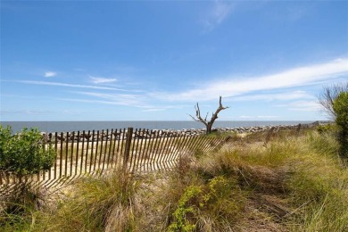 This oceanfront townhome-style beach cottage at The Cottages at on Jekyll Island Golf Club in Georgia - for sale on GolfHomes.com, golf home, golf lot