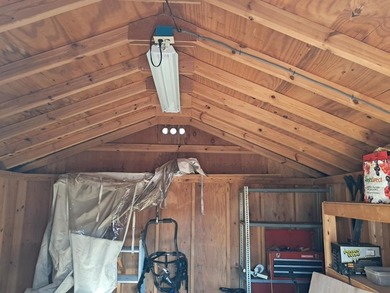 Oversized cul de sac lot with nice shed and camper on site on Captains Cove Golf and Yacht Club in Virginia - for sale on GolfHomes.com, golf home, golf lot