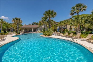 This oceanfront townhome-style beach cottage at The Cottages at on Jekyll Island Golf Club in Georgia - for sale on GolfHomes.com, golf home, golf lot