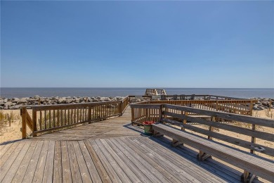 This oceanfront townhome-style beach cottage at The Cottages at on Jekyll Island Golf Club in Georgia - for sale on GolfHomes.com, golf home, golf lot