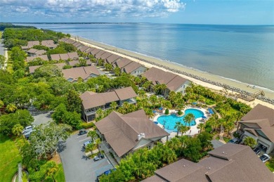 This oceanfront townhome-style beach cottage at The Cottages at on Jekyll Island Golf Club in Georgia - for sale on GolfHomes.com, golf home, golf lot