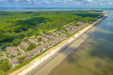 This oceanfront townhome-style beach cottage at The Cottages at on Jekyll Island Golf Club in Georgia - for sale on GolfHomes.com, golf home, golf lot