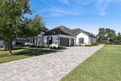 Welcome to 25861 Crossings Bluff, an exceptional estate built in on Red Tail Golf Club in Florida - for sale on GolfHomes.com, golf home, golf lot