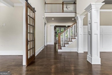This magnificent home seamlessly blends modern design with on Hamilton Mill Golf Club in Georgia - for sale on GolfHomes.com, golf home, golf lot