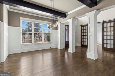 This magnificent home seamlessly blends modern design with on Hamilton Mill Golf Club in Georgia - for sale on GolfHomes.com, golf home, golf lot