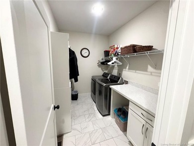 Situated along the sixth fairway of the beautiful Champions on Champions Pointe Golf Course in Indiana - for sale on GolfHomes.com, golf home, golf lot