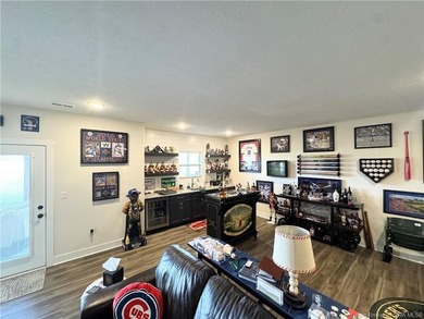 Situated along the sixth fairway of the beautiful Champions on Champions Pointe Golf Course in Indiana - for sale on GolfHomes.com, golf home, golf lot