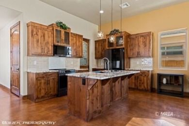 Discover modern desert living at 479 Apogee CRST!! This stunning on Falcon Ridge Golf Course in Nevada - for sale on GolfHomes.com, golf home, golf lot