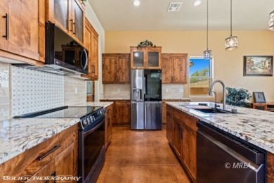 Discover modern desert living at 479 Apogee CRST!! This stunning on Falcon Ridge Golf Course in Nevada - for sale on GolfHomes.com, golf home, golf lot