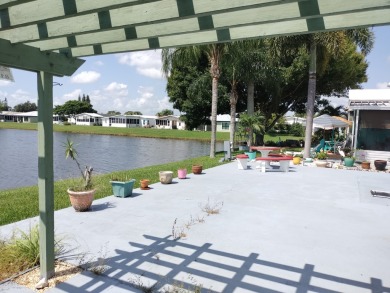 MASSIVE WATERFRONT HOME! OVER 1,600 SQ.FT! 2 bed 2 bath 1,664 sq on Spanish Lakes Fairways in Florida - for sale on GolfHomes.com, golf home, golf lot