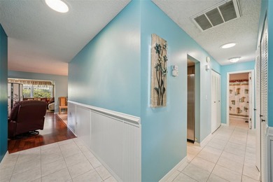 Under contract-accepting backup offers. This beautifully on Falcon Watch Golf Club in Florida - for sale on GolfHomes.com, golf home, golf lot