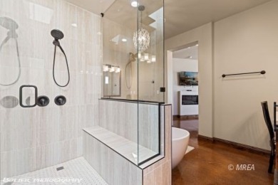 Discover modern desert living at 479 Apogee CRST!! This stunning on Falcon Ridge Golf Course in Nevada - for sale on GolfHomes.com, golf home, golf lot