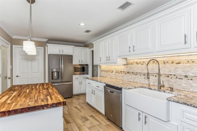 Come live the Florida lifestyle with this golf course home in on Scenic Hills Country Club in Florida - for sale on GolfHomes.com, golf home, golf lot