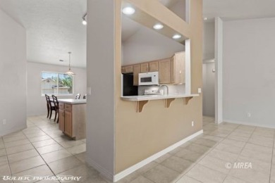 Welcome to 871 Falcon Glen Drive, a charming single-family home on Falcon Ridge Golf Course in Nevada - for sale on GolfHomes.com, golf home, golf lot