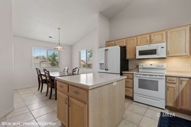 Welcome to 871 Falcon Glen Drive, a charming single-family home on Falcon Ridge Golf Course in Nevada - for sale on GolfHomes.com, golf home, golf lot