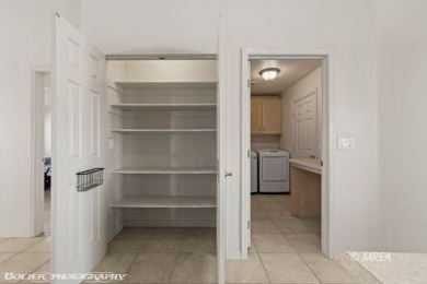 Welcome to 871 Falcon Glen Drive, a charming single-family home on Falcon Ridge Golf Course in Nevada - for sale on GolfHomes.com, golf home, golf lot