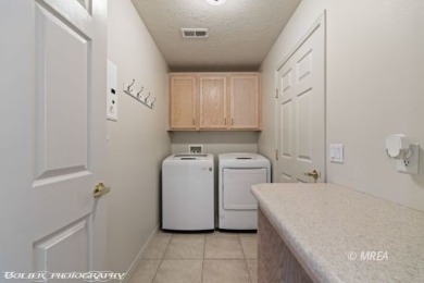 Welcome to 871 Falcon Glen Drive, a charming single-family home on Falcon Ridge Golf Course in Nevada - for sale on GolfHomes.com, golf home, golf lot