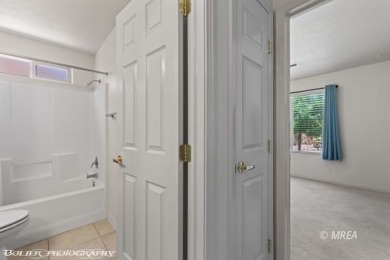 Welcome to 871 Falcon Glen Drive, a charming single-family home on Falcon Ridge Golf Course in Nevada - for sale on GolfHomes.com, golf home, golf lot