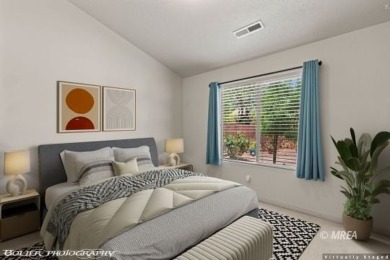 Welcome to 871 Falcon Glen Drive, a charming single-family home on Falcon Ridge Golf Course in Nevada - for sale on GolfHomes.com, golf home, golf lot