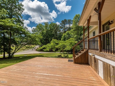 Welcome to Lake Royale! This adorable 3-bedroom home is situated on River Golf and County Club at Lake Royale in North Carolina - for sale on GolfHomes.com, golf home, golf lot